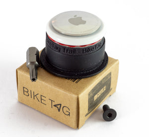 BikeTag and Airtag on a cardboard box with accessories around